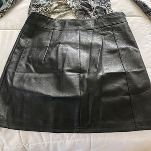 Leather zip up mini skirt
